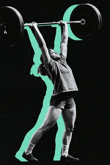 A woman pressing a barbell overhead against green rays, black and white.
